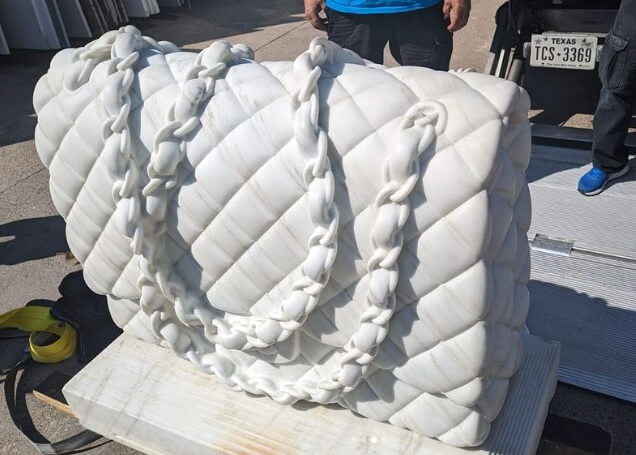 fine art movers ship 3000 lb marble chanel bag